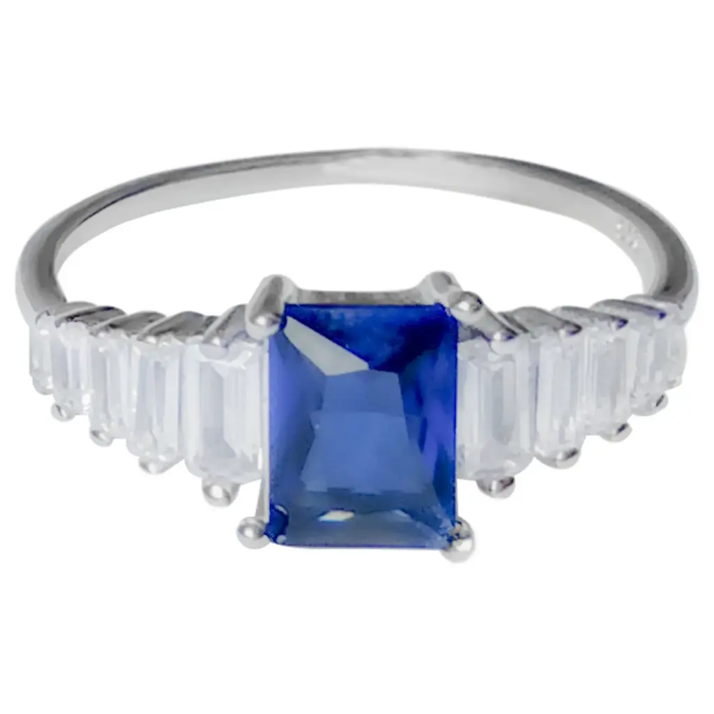 AN PIEDRA AZUL CON BAGUETTS, PLATA RODIZADA