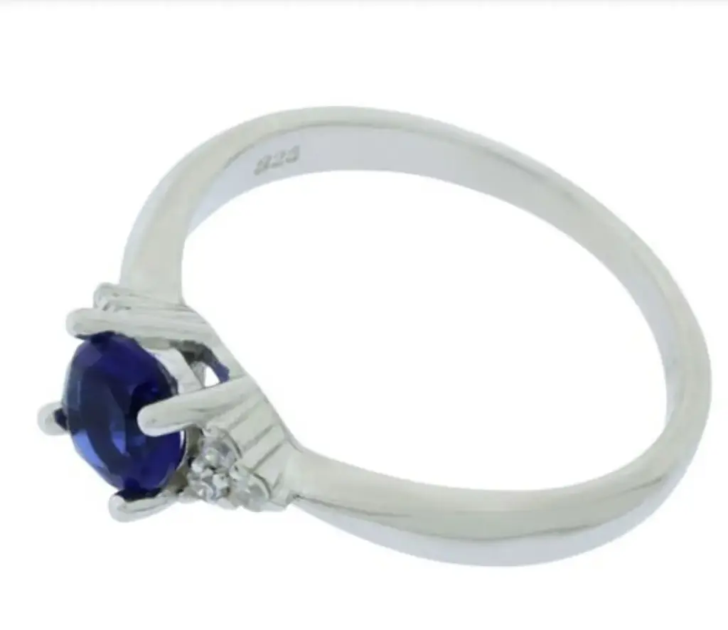 AN ZIRCONIA AZUL, PLATA RODIZADA